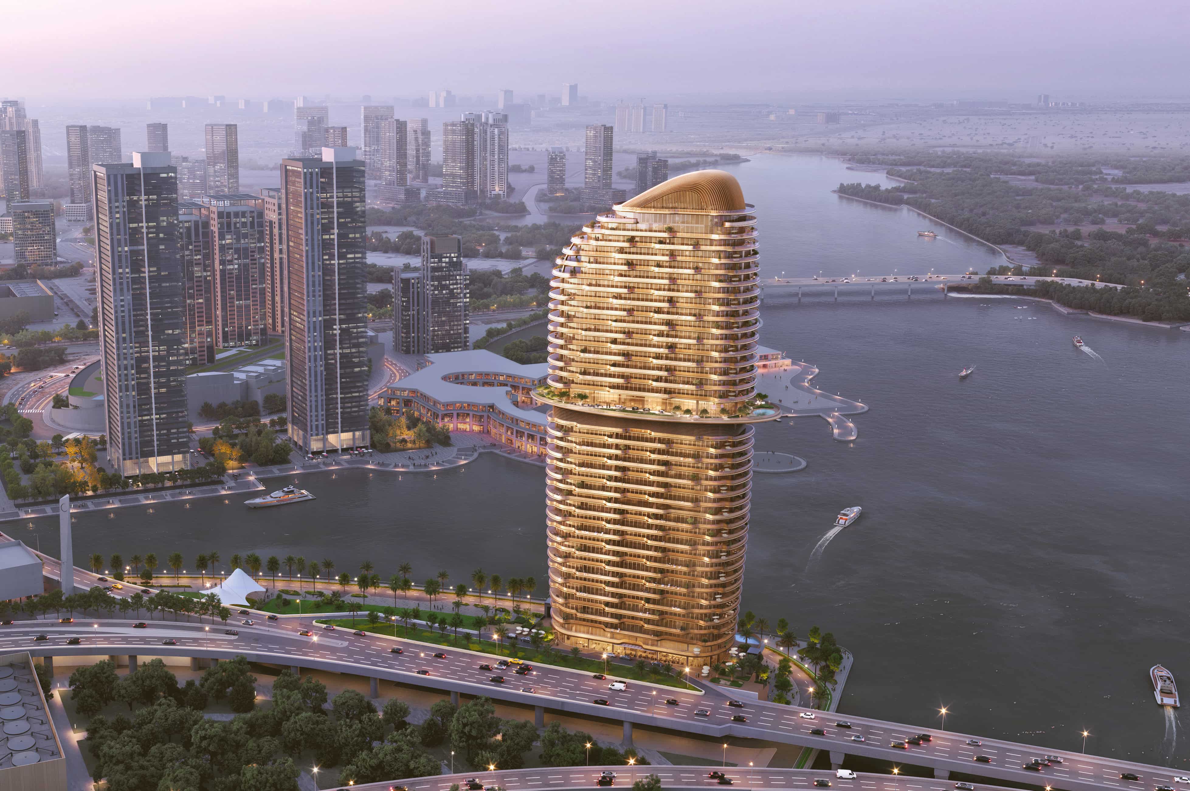 Exterior view of Jumeirah Residences Al Maryah Island showcasing the amber‑hued waterfront tower.